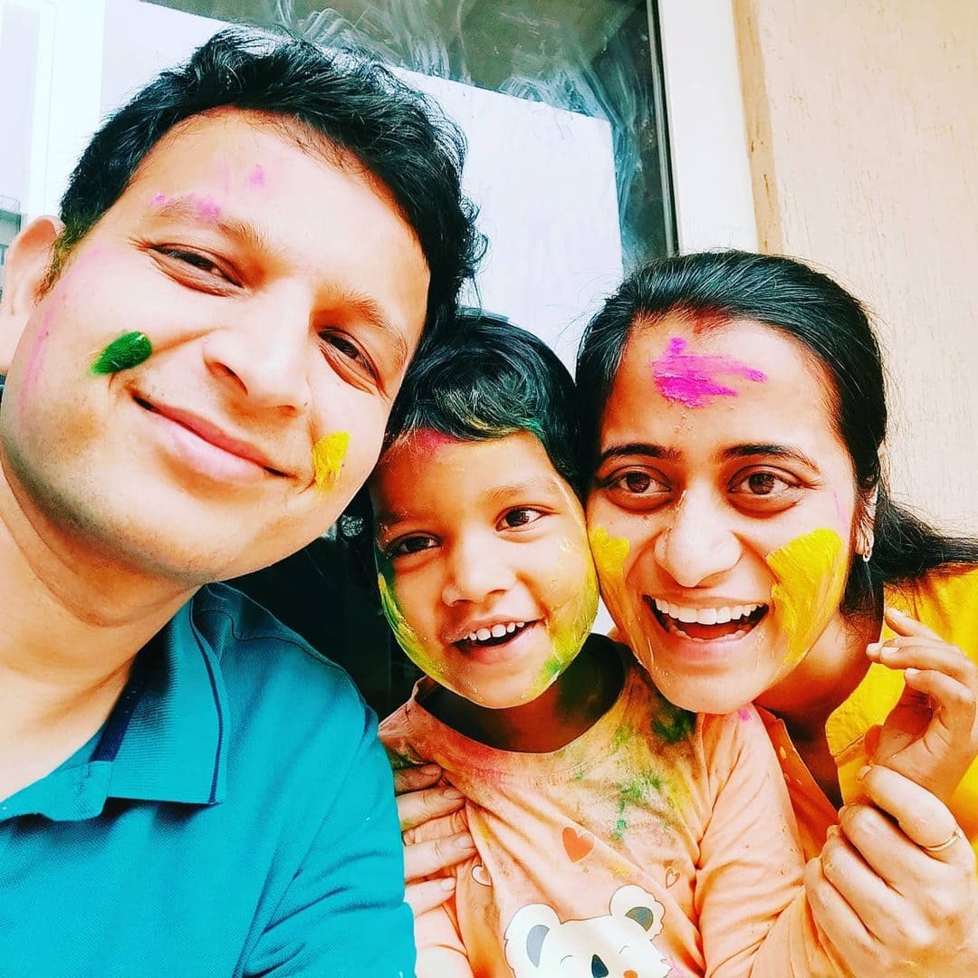 Roshni Mukherjee with her husband and their daughter 